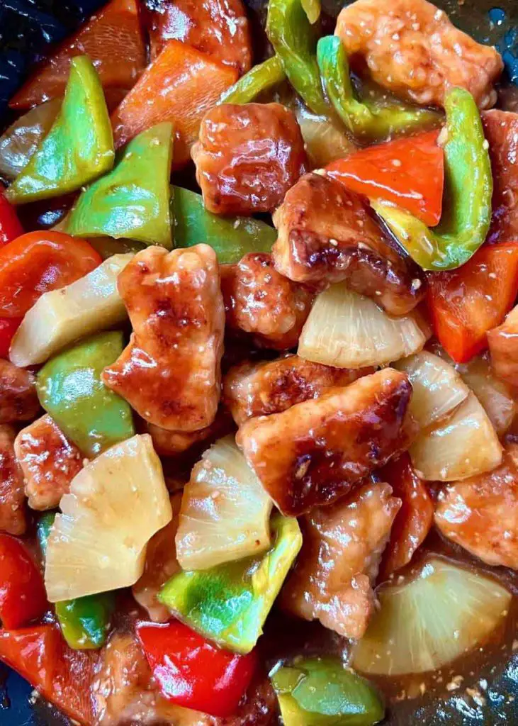This sweet and sour pork with pineapple takes less than 30 minutes. With this one-pot recipe, it's easy, tastier, less greasy, and healthier than a take-out dish.