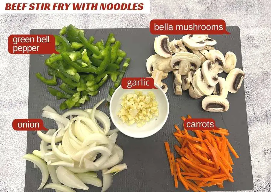 beef stir fry with noodles ingredient contain: beef, baby bella mushrooms, carrots, onion, garlic and green bell pepper.
