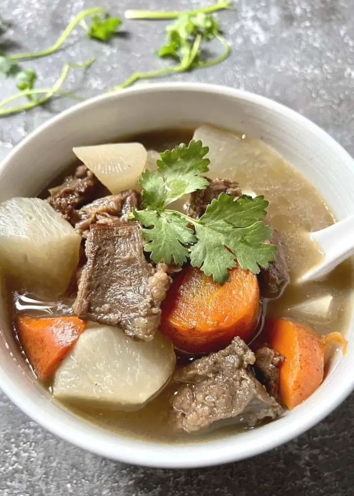 beef vegetable soup with daikon radish, onion and carrot