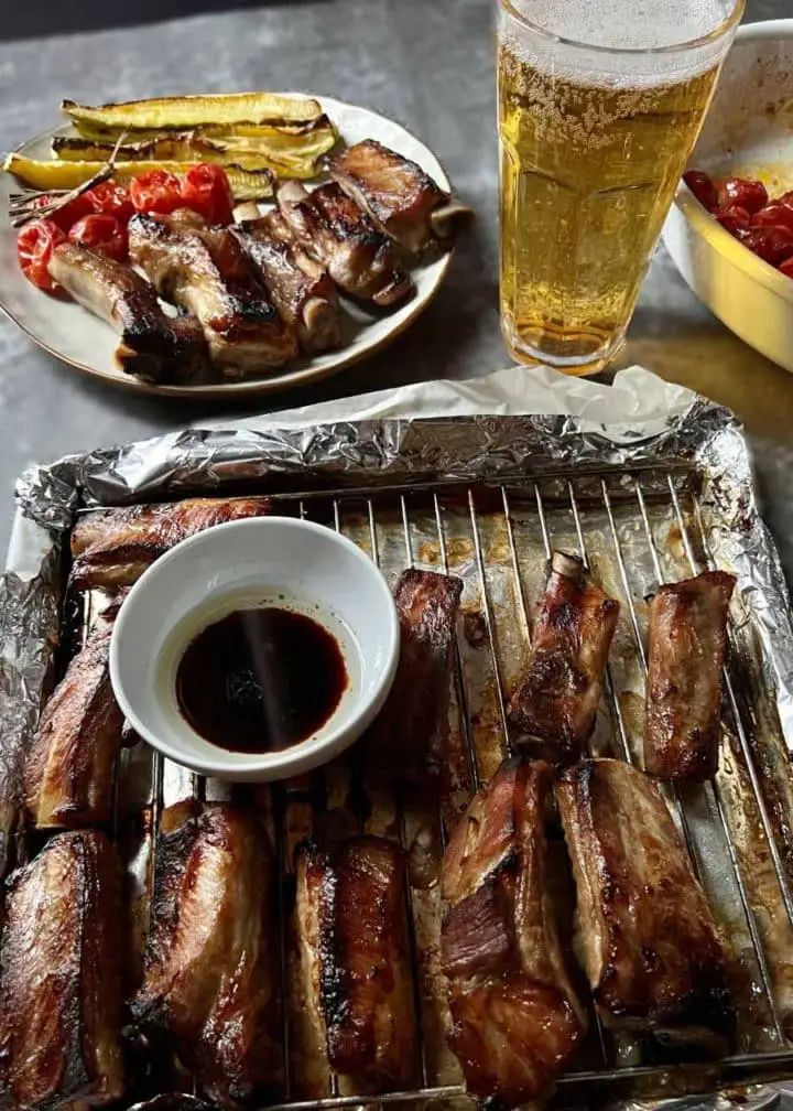 pork ribs with cherry tomato and zucchini-beer