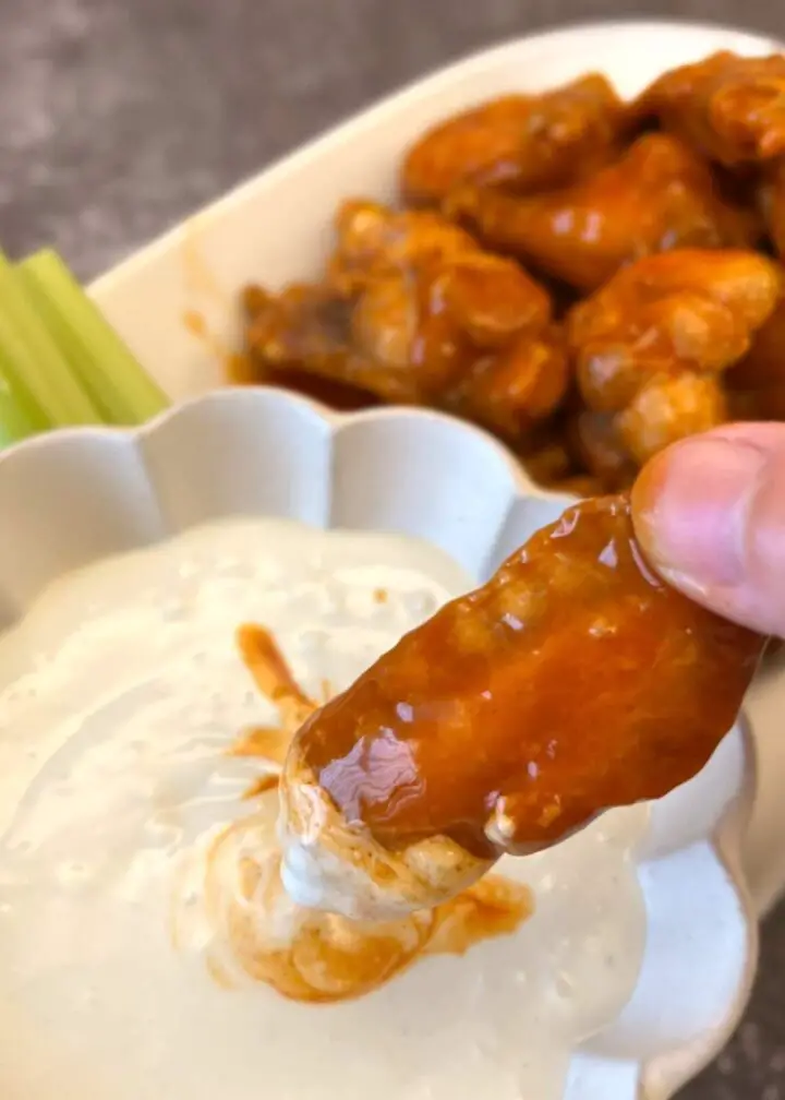 Baked buffalo wings with cheese dip